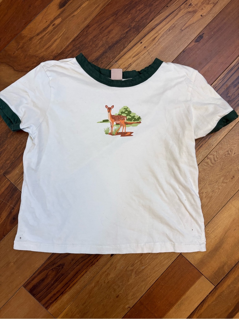 White Crop Ringer Tee with Green Trim and Deer Graphic